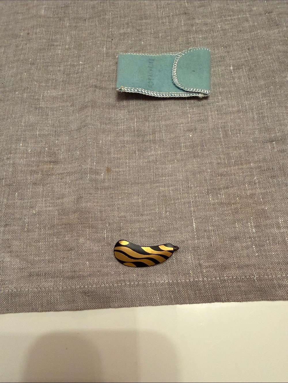Tiffany & Co. Gold and Black Wave-Striped barrette with silver backing